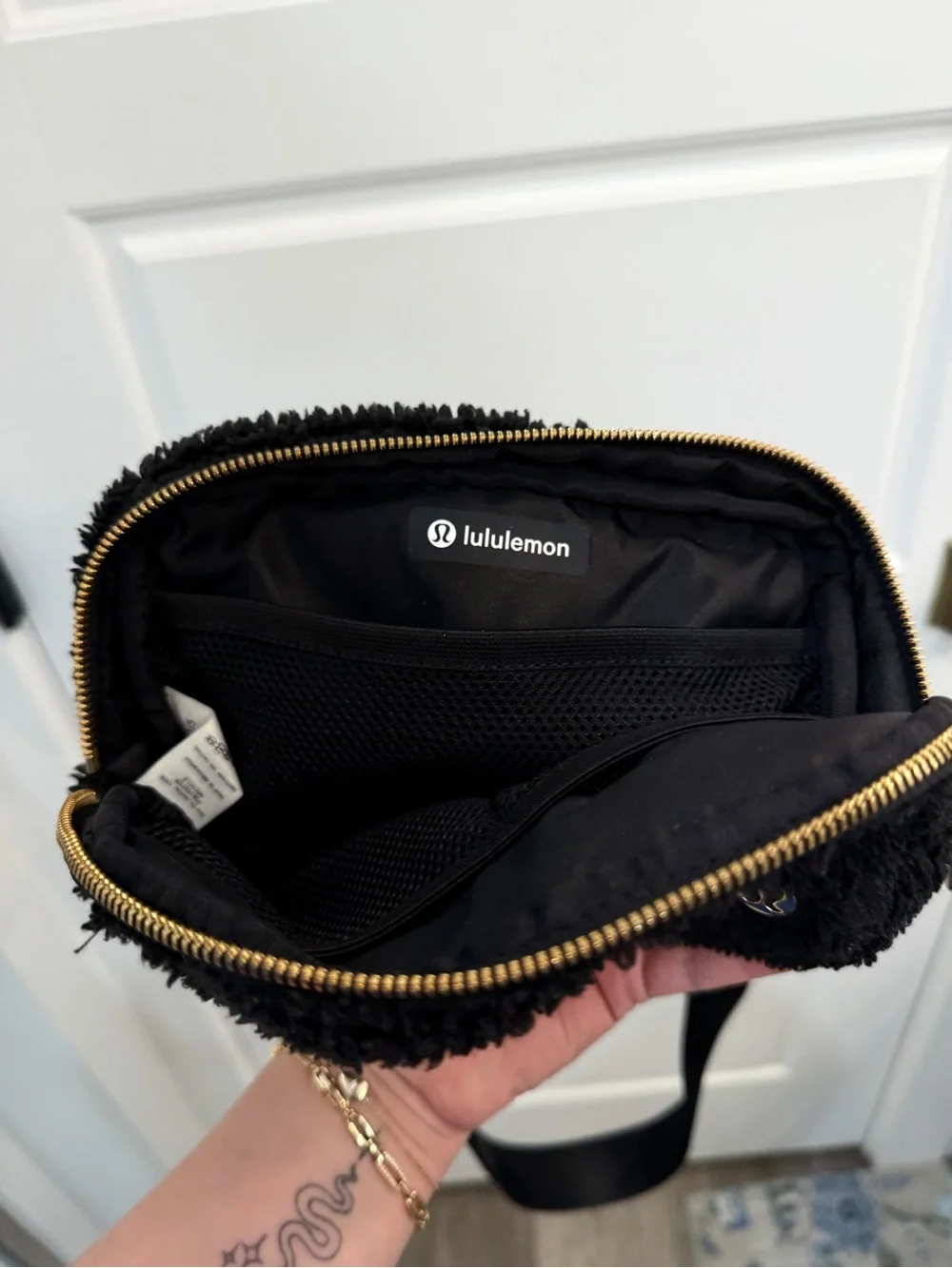 lululemon athletica Black Sherpa Crossbody Pouch with Gold Logo